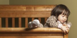 Toddler,Climbing,Out,Of,Her,Crib.