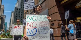 New York, United States. 28th July, 2016. CUNY staff members are protesting the exploitation of adjunct faculty by CUNY, as they are denied office hours and equal pay for equal work, and often prevented from even working enough classes to pay the bills wh