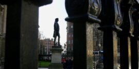 Statue,Of,Edmund,Burke,At,Trinity,College,Dublin,Seen,Through