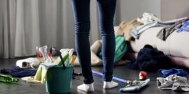 mom in dirty house_shutterstock_1052789693