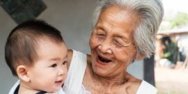 Asian Grandmother with baby
