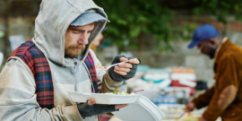 homeless man eating charity food