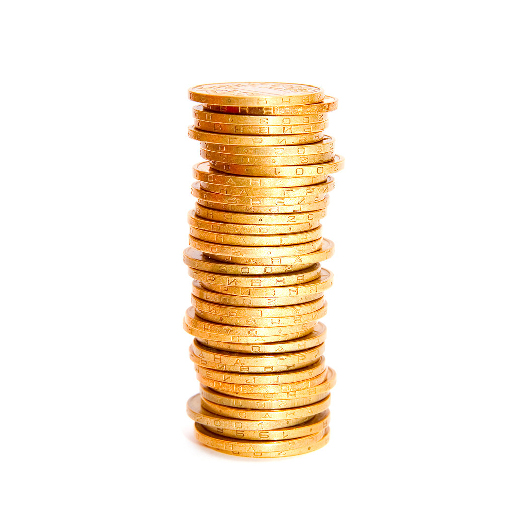 Stacks of coins with various amounts representing account minimums.